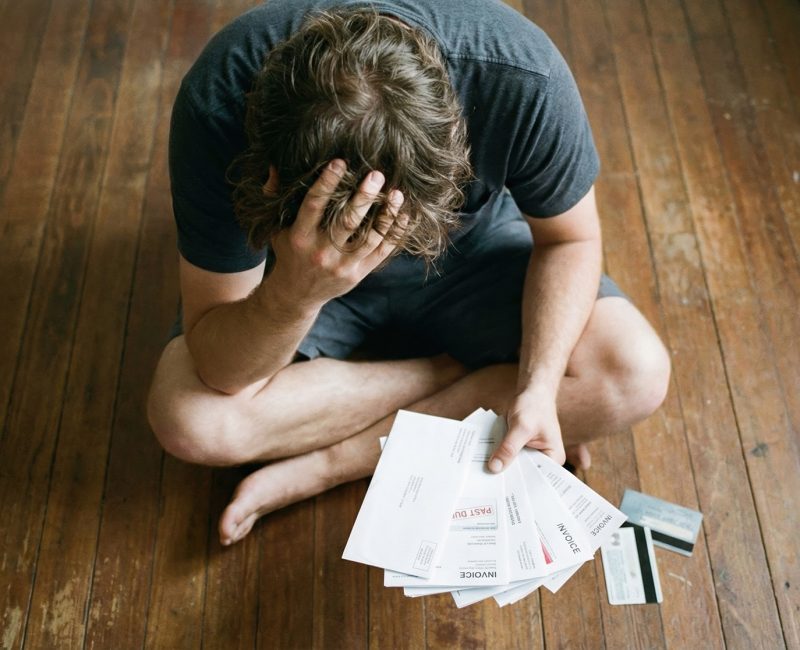 vecteezy headache and stress overwhelm man holding his head in pain